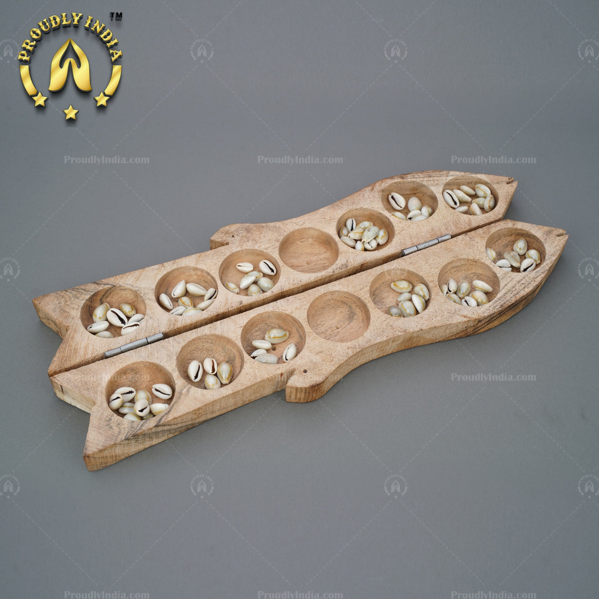 Wooden Fish Pallanguzhi with Sea Shells.