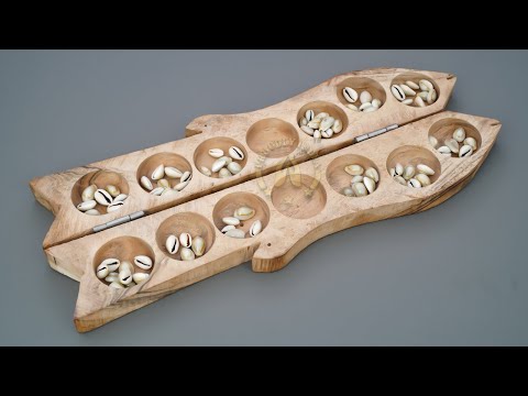 Wooden Fish Pallanguzhi with Sea Shells.