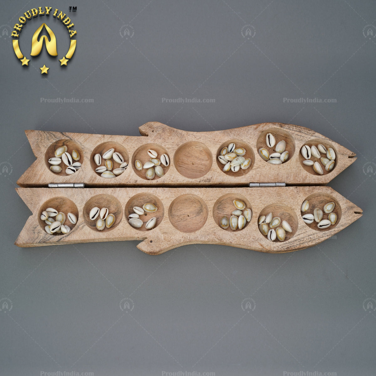 Wooden Fish Pallanguzhi with Sea Shells.
