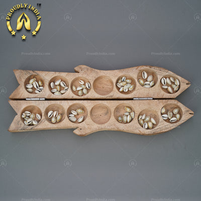 Wooden Fish Pallanguzhi with Sea Shells.