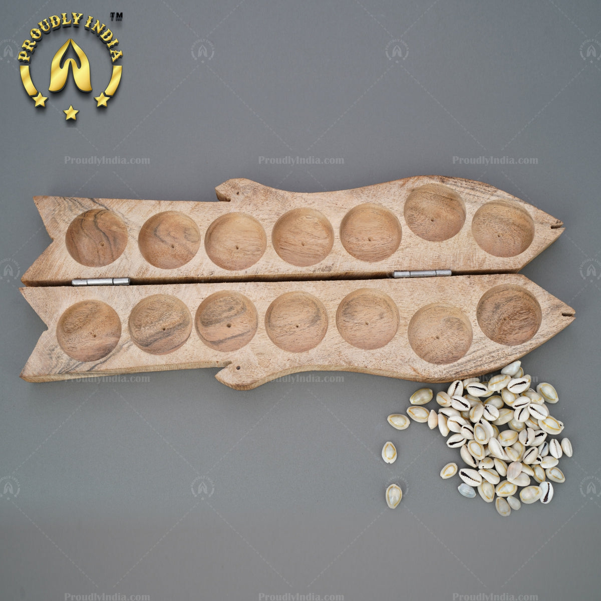 Wooden Fish Pallanguzhi with Sea Shells.