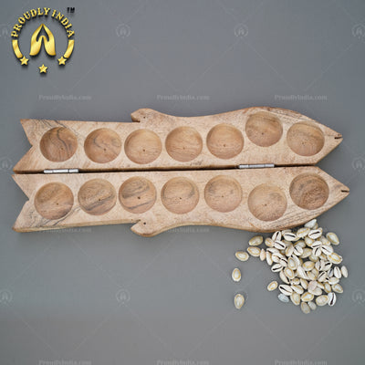 Wooden Fish Pallanguzhi with Sea Shells.