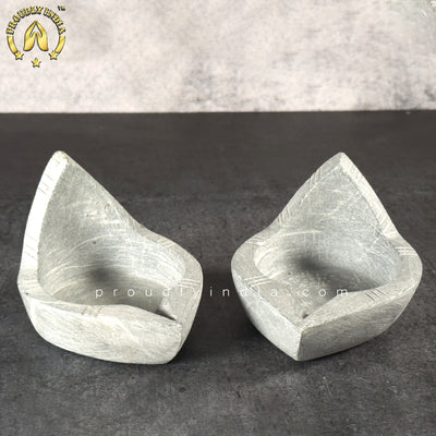stone vilakku